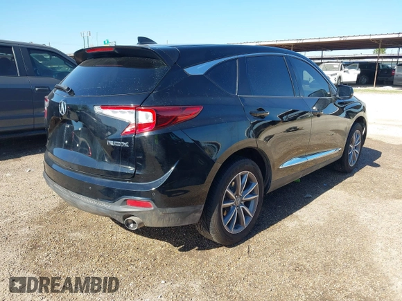 2021 Acura RDX Technology with VIN 5J8TC1H53ML001319, listed as a IAAI auction lot 41972431 with 89,698 mi miles and . Bid and sale history available at DreamBid. Image 4.