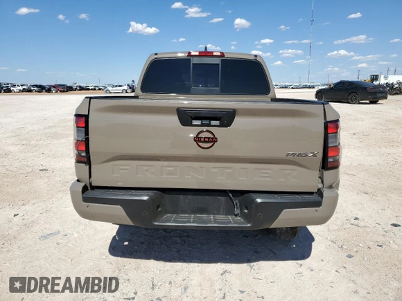 2022 Nissan Frontier Pro-X with VIN 1N6ED1EJ3NN606031, listed as a Copart auction lot 63337253 with 31,947 mi miles and Salvage title. Bid and sale history available at DreamBid. Image 6.