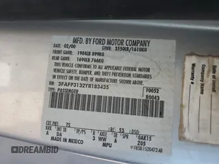 2000 Ford Focus ZX3 with VIN 3FAFP3132YR183435, listed as a Copart auction lot 60214034 with Not provided miles and Salvage title. Bid and sale history available at DreamBid. Image 12.