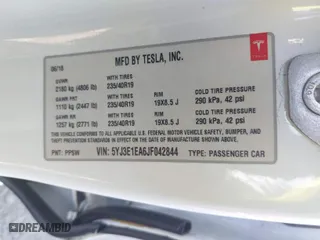 2018 Tesla Model 3 Long Range Battery with VIN 5YJ3E1EA6JF042844, listed as a IAAI auction lot 41349172 with 122,851 mi miles. Bid and sale history available at carsss.com. Image 9.