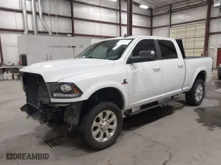 2018 Ram 2500 Laramie with VIN 3C6UR5FL1JG213467, listed as a IAAI auction lot 41513596 with 100,855 mi miles. Bid and sale history available at carsss.com. Image 2.