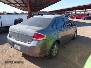2009 Ford Focus SE z VIN 1FAHP35N79W166875, wystawiony jako IAAI lot #41506700 z przebiegiem 174 061 mil mil oraz . Historia ofert i sprzedaży dostępna na DreamBid. Obrazek 4.