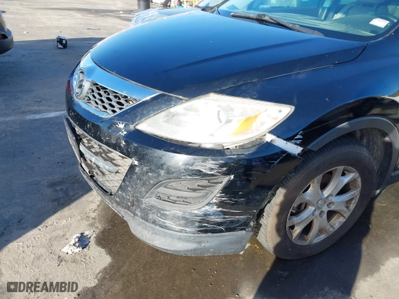 2012 Mazda CX-9 Touring with VIN JM3TB3CV5C0366144, listed as a IAAI auction lot 41590016 with 133,875 mi miles. Bid and sale history available at carsss.com. Image 6.