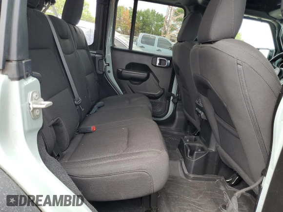 2023 Jeep Wrangler Sport S z VIN 1C4HJXDN7PW681537, wystawiony jako Copart lot #63458155 z przebiegiem 18 602 mil mil oraz Szkoda całkowita • Salvage title. Historia ofert i sprzedaży dostępna na DreamBid. Obrazek 11.