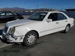 1998 Mercedes-Benz E-Class with VIN WDBJF25F3WA566702, listed as a Copart auction lot 81723704 with Not Provided miles and Salvage Title. Bid and sale history available at carsss.com. Image 1.