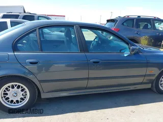 2000 BMW 5 Series 528iA with VIN WBADM6343YGV01651, listed as a IAAI auction lot 41745574 with 143,898 mi miles. Bid and sale history available at carsss.com. Image 13.