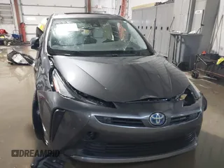 2021 Toyota Prius L Eco with VIN JTDKAMFU9M3132587, listed as a IAAI auction lot 41637275 with 84,203 mi miles. Bid and sale history available at carsss.com. Image 12.