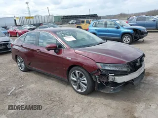 2018 Honda Clarity Plug-In Hybrid with VIN JHMZC5F17JC016058, listed as a IAAI auction lot 41924134 with 57,583 mi miles. Bid and sale history available at carsss.com. Image 1.