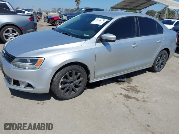 2011 Volkswagen Jetta SE with VIN 3VWDZ7AJ4BM394140, listed as a IAAI auction lot 42284735 with 177,495 mi miles and . Bid and sale history available at DreamBid. Image 2.