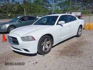 2012 Dodge Charger SE with VIN 2C3CDXBG1CH211300, listed as a IAAI auction lot 42049480 with 156,303 mi miles and . Bid and sale history available at DreamBid. Image 2.