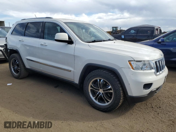 2011 Jeep Grand Cherokee Laredo with VIN 1J4RR4GG8BC718852, listed as a Copart auction lot 49852535 with 101,945 mi miles and Salvage Title. Bid and sale history available at carsss.com. Image 4.