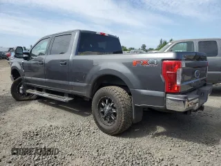 2019 Ford F-250 XL with VIN 1FT7W2BT9KEC24552, listed as a Copart auction lot 60644435 with 115,689 mi miles and Salvage title. Bid and sale history available at DreamBid. Image 2.