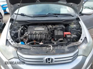 2010 Honda Insight EX with VIN JHMZE2H77AS022538, listed as a IAAI auction lot 41804579 with 184,000 mi miles and . Bid and sale history available at DreamBid. Image 10.