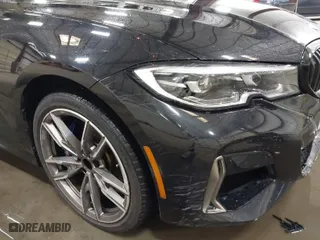 2020 BMW 3 Series M340i with VIN WBA5U7C05LFH82599, listed as a IAAI auction lot 41844916 with 51,533 mi miles. Bid and sale history available at carsss.com. Image 6.