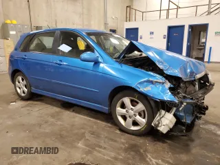 2007 Kia Spectra with VIN KNAFE161775007569, listed as a Copart auction lot 86778784 with 125,463 mi miles and Salvage Title. Bid and sale history available at carsss.com. Image 4.