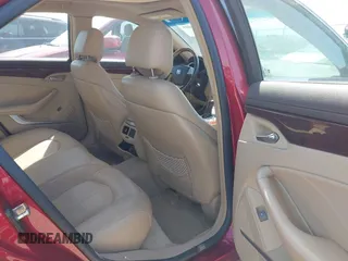 2008 Cadillac CTS RWD w/1SB with VIN 1G6DV57V980213836, listed as a IAAI auction lot 42006005 with 124,596 mi miles. Bid and sale history available at carsss.com. Image 8.