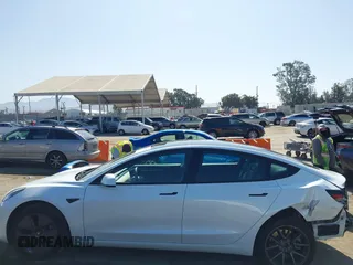 2023 Tesla Model 3 z VIN 5YJ3E1EA5PF401237, wystawiony jako IAAI lot #42520423 z przebiegiem 45 262 mil mil oraz . Historia ofert i sprzedaży dostępna na DreamBid. Obrazek 15.