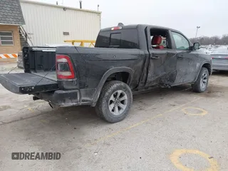 2019 Ram 1500 Rebel z VIN 1C6SRFLT6KN599362, wystawiony jako IAAI lot #41560018 z przebiegiem Nie podano mil oraz . Historia ofert i sprzedaży dostępna na DreamBid. Obrazek 4.