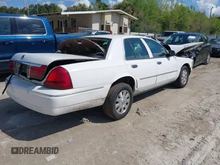 2003 Mercury Grand Marquis LS Premium with VIN 2MEFM75W53X699635, listed as a IAAI auction lot 42002694 with 154,781 mi miles and . Bid and sale history available at DreamBid. Image 4.