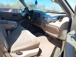 1999 Ford F-150 XL с VIN 1FTRX18L4XKB33057, выставлен на аукционе IAAI как лот 42227009 с пробегом Не указан миль и . История ставок и продаж доступна на DreamBid. Изображение 5.