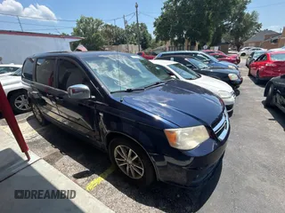 2014 Dodge Grand Caravan SXT with VIN 2C4RDGCG1ER308403, listed as a Copart auction lot 56712885 with 131,847 mi miles and Clean Title. Bid and sale history available at DreamBid. Image 1.