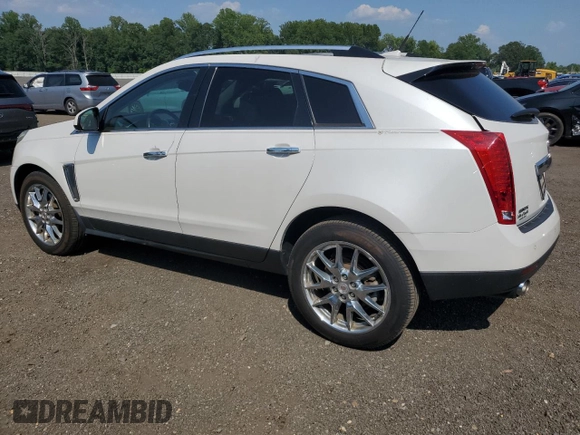 2014 Cadillac SRX Performance Collection with VIN 3GYFNCE38ES629600, listed as a Copart auction lot 61622725 with 86,183 mi miles and Salvage title. Bid and sale history available at DreamBid. Image 2.