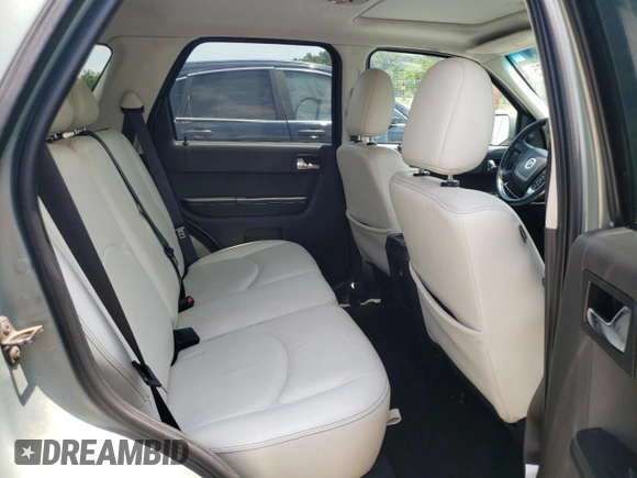 2008 Mercury Mariner Premier with VIN 4M2CU97178KJ45308, listed as a Copart auction lot 64947075 with 140,403 mi miles and Salvage title. Bid and sale history available at DreamBid. Image 11.