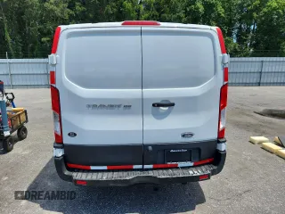 2019 Ford Transit with VIN 1FTYE1YM3KKB48149, listed as a Copart auction lot 60661245 with 133,139 mi miles and Salvage title. Bid and sale history available at DreamBid. Image 6.
