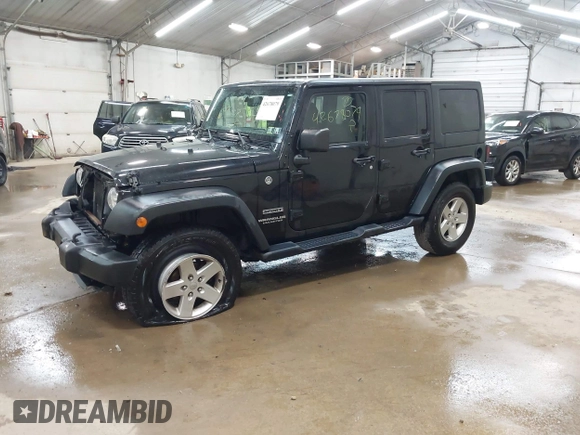 2017 Jeep Wrangler Unlimited Sport with VIN 1C4BJWDG6HL701149, listed as a IAAI auction lot 42678079 with 101,073 mi miles and . Bid and sale history available at DreamBid. Image 2.