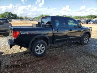 2012 Nissan Titan SV with VIN 1N6BA0EC6CN312465, listed as a Copart auction lot 58722815 with 186,207 mi miles and Salvage title. Bid and sale history available at DreamBid. Image 3.