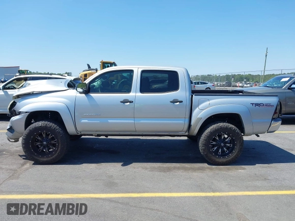 2013 Toyota Tacoma PreRunner z VIN 5TFJU4GN6DX032952, wystawiony jako IAAI lot #42001014 z przebiegiem 152 755 mil mil oraz . Historia ofert i sprzedaży dostępna na DreamBid. Obrazek 14.