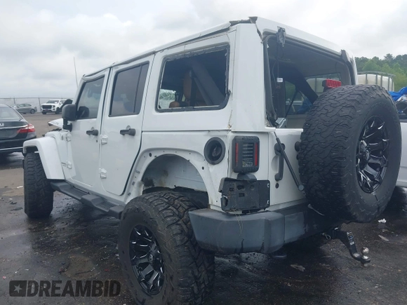 2016 Jeep Wrangler Unlimited Rubicon Hard Rock with VIN 1C4BJWFG3GL228449, listed as a IAAI auction lot 42158318 with Not provided miles and . Bid and sale history available at DreamBid. Image 3.