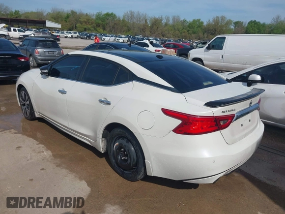 2016 Nissan Maxima SL with VIN 1N4AA6AP5GC383075, listed as a IAAI auction lot 41415505 with 164,392 mi miles and . Bid and sale history available at DreamBid. Image 3.