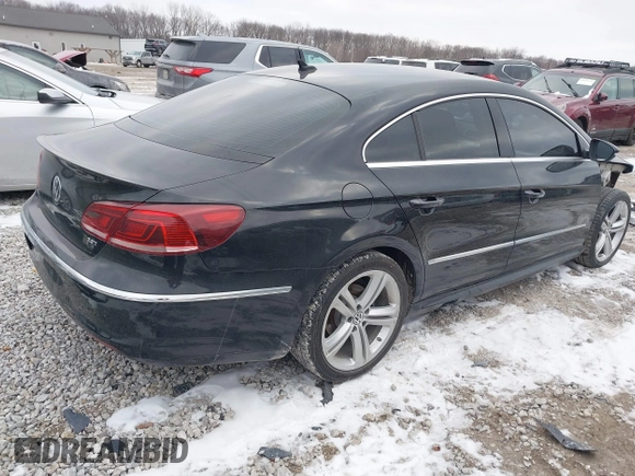 2015 Volkswagen CC Sport with VIN WVWBN7AN6FE819703, listed as a IAAI auction lot 41638624 with 103,785 mi miles and . Bid and sale history available at DreamBid. Image 4.