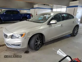 2017 Volvo S60 Inscription Platinum with VIN LYV402TM0HB130872, listed as a Copart auction lot 86848694 with 124,827 mi miles and Salvage Title. Bid and sale history available at carsss.com. Image 1.