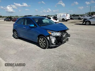 2023 Kia Rio S with VIN 3KPA25AD9PE548173, listed as a Copart auction lot 50232915 with 26,668 mi miles and Salvage Title. Bid and sale history available at DreamBid. Image 11.