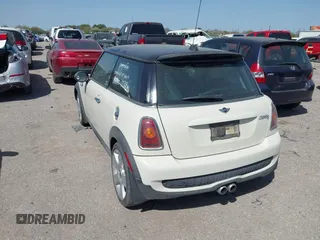 2007 MINI Hardtop S with VIN WMWMF73527TT82098, listed as a IAAI auction lot 41828664 with 107,418 mi miles and . Bid and sale history available at DreamBid. Image 3.