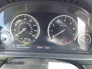2013 BMW 5 Series 528i xDrive z VIN WBAXH5C50DD109923, wystawiony jako IAAI lot #42328644 z przebiegiem 129 764 mil mil oraz . Historia ofert i sprzedaży dostępna na DreamBid. Obrazek 7.