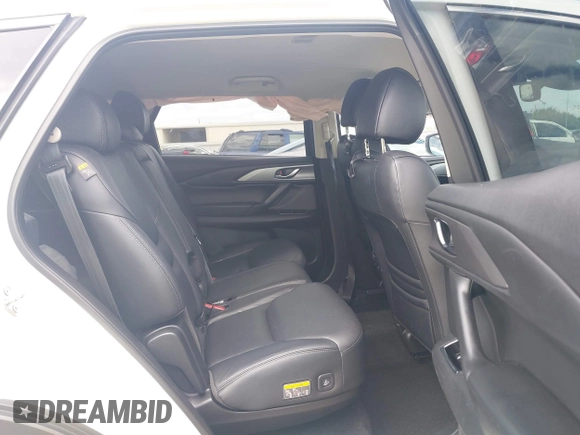 2022 Mazda CX-9 Touring with VIN JM3TCBCY0N0608052, listed as a IAAI auction lot 42027465 with 65,313 mi miles and . Bid and sale history available at DreamBid. Image 8.