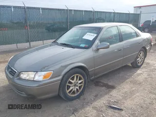 2001 Toyota Camry LE z VIN 4T1BF28K81U116710, wystawiony jako IAAI lot #41923429 z przebiegiem 145 741 mil mil oraz . Historia ofert i sprzedaży dostępna na DreamBid. Obrazek 2.