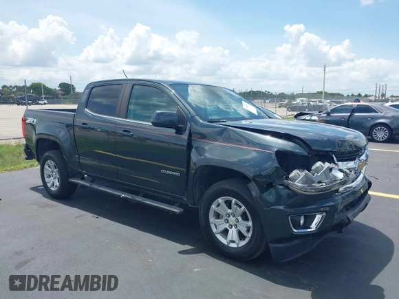 2018 Chevrolet Colorado 2WD LT z VIN 1GCGSCEA9J1137767, wystawiony jako IAAI lot #42389519 z przebiegiem 116 547 mil mil oraz . Historia ofert i sprzedaży dostępna na DreamBid. Obrazek 1.
