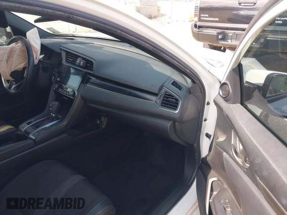 2021 Honda Civic Sport with VIN SHHFK7H46MU217885, listed as a IAAI auction lot 41942520 with 82,328 mi miles and . Bid and sale history available at DreamBid. Image 5.