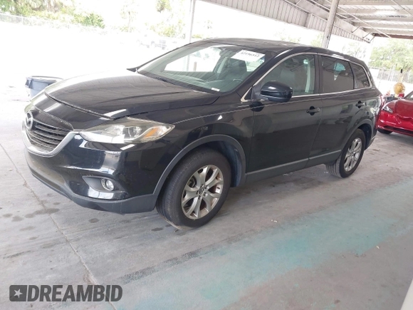 2014 Mazda CX-9 Touring with VIN JM3TB2CA2E0446267, listed as a IAAI auction lot 42196512 with 98,670 mi miles and . Bid and sale history available at carsss.com. Image 2.