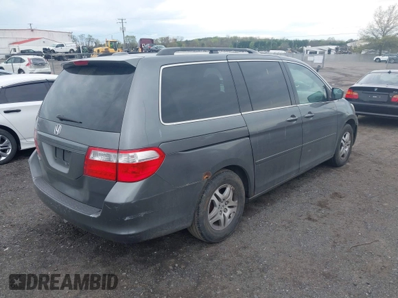 2007 Honda Odyssey EX-L with VIN 5FNRL38777B074397, listed as a IAAI auction lot 41965461 with 210,696 mi miles. Bid and sale history available at carsss.com. Image 4.