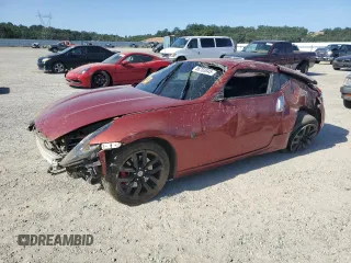2014 Nissan 370Z with VIN JN1AZ4EH1EM631732, listed as a Copart auction lot 58783845 with Not provided miles and Salvage title. Bid and sale history available at DreamBid. Image 1.