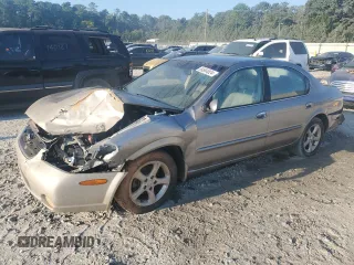 2001 Nissan Maxima GXE z VIN JN1CA31D11T828767, wystawiony jako Copart lot #69504024 z przebiegiem 177 431 mil mil oraz Szkoda całkowita • Salvage title. Historia ofert i sprzedaży dostępna na DreamBid. Obrazek 1.