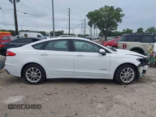 2019 Ford Fusion SE with VIN 3FA6P0LU4KR204801, listed as a IAAI auction lot 41977106 with 101,675 mi miles. Bid and sale history available at carsss.com. Image 14.