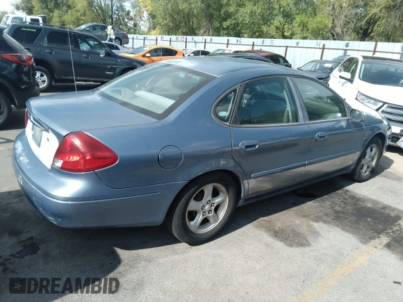 2000 Ford Taurus SES with VIN 1FAFP5520YG224438, listed as a IAAI auction lot 34978265 with 104,577 mi miles and . Bid and sale history available at DreamBid. Image 4.