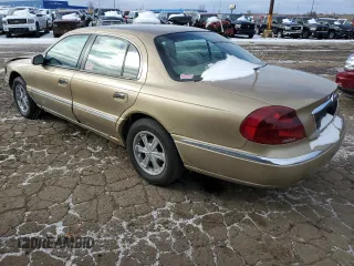 1999 Lincoln Continental with VIN 1LNHM97V2XY644250, listed as a Copart auction lot 82440454 with 196,568 mi miles and Clean Title. Bid and sale history available at carsss.com. Image 2.