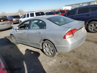 2010 Honda Civic Sdn LX with VIN 2HGFA1F57AH319863, listed as a Copart auction lot 46501615 with 0 mi miles and Salvage Title. Bid and sale history available at carsss.com. Image 2.